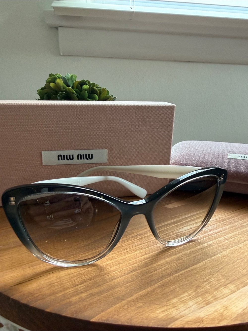 Miu Miu Two-Tone Cat Eye Sunglasses in Black and Cream